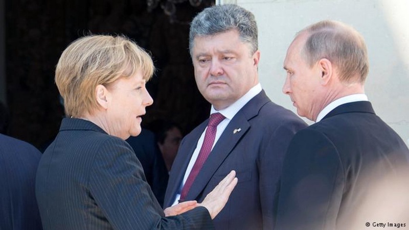 Ангела Меркель, Петр Порошенко и Владимир Путин. Фото с сайта dw.de